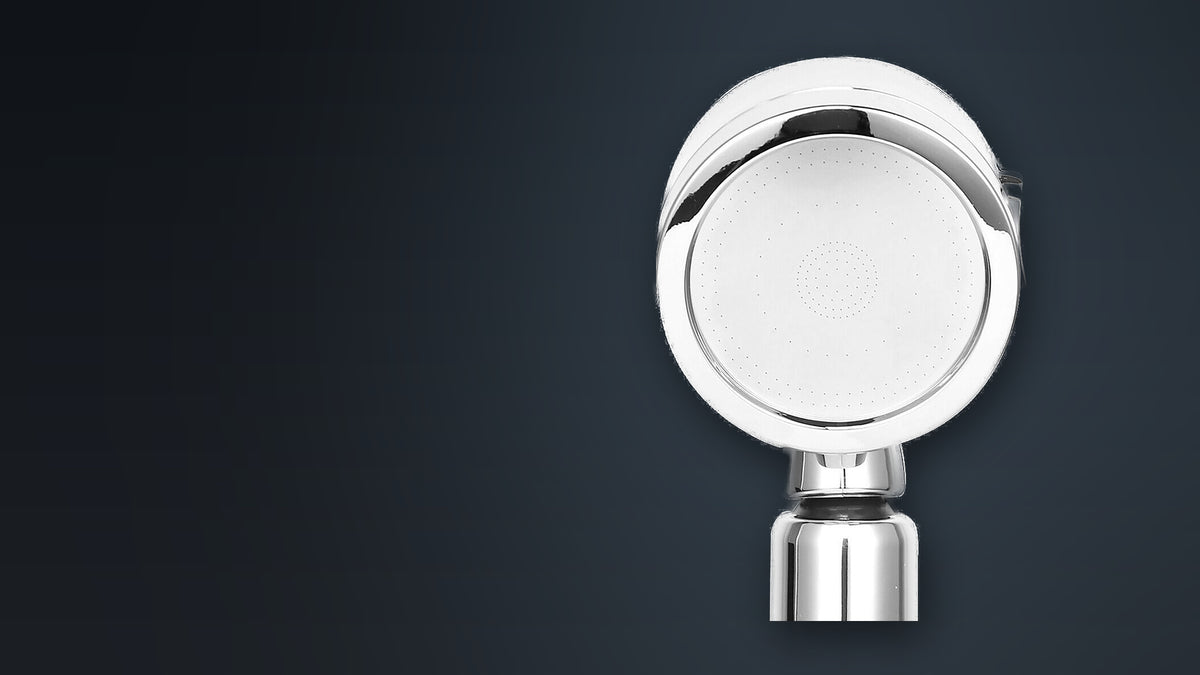 Sahos filtered shower head on a dark studio background